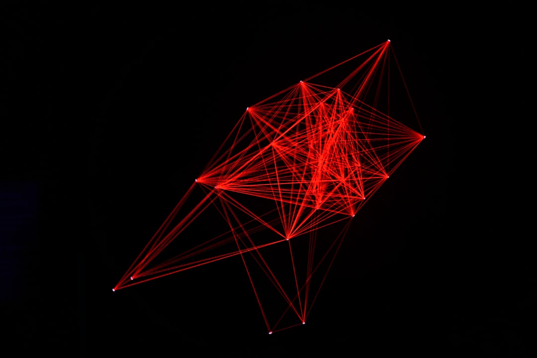 abstract-red-geometric-network-on-black-background-aqtiflliixa